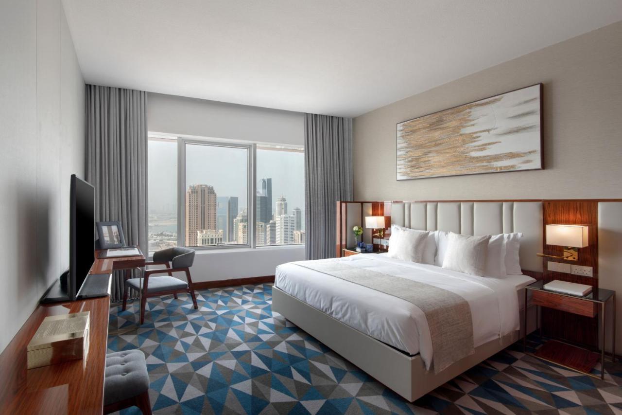 דוחה The Bentley Luxury Hotel & Suites מראה חיצוני תמונה A bedroom at the hotel